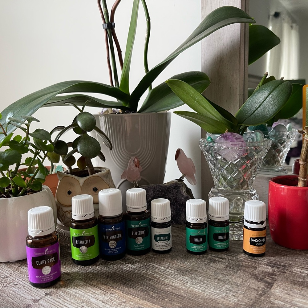 Young Living Essential Oils with Green, Blue, and Orange Labels